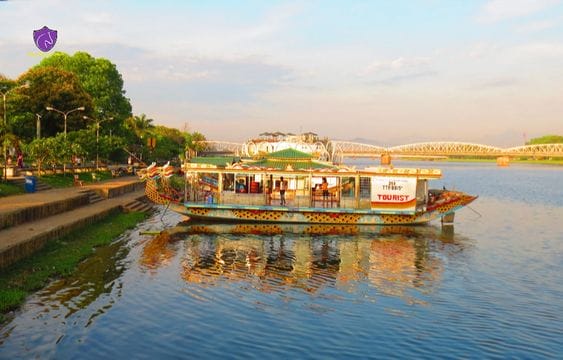 SUN SET ON PERFUME RIVER WITH TEA-BREAK ON BOARD